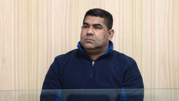 NZ's first convicted human trafficker freed after serving third of prison sentence.